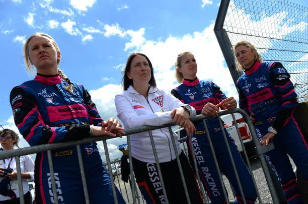 MTR24-Blog-Ferrari 488 GTE drivers Dannish driver Gatting Michelle (L), Italian's driver Manuela Gostner (2ndR) and Swiss' driver Rahel Frey Jeffrey Segal (2R) look on prior the 87th edition of the 24 Hours Le Mans endurance race, at Le Mans northwestern France, on June 15, 2019.
